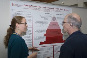 Dr. Kristin Berg presents a poster at DOM Research Day 2018