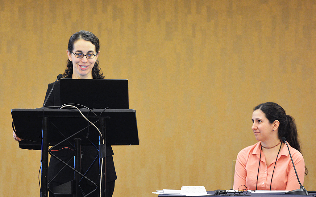 UW-CTRI Researcher Dr. Tanya Schlam (left) presents research findings during an SRNT symposium in San Francisco moderated by UW-CTRI Researcher Madeline Oguss (right). Oguss also presented. 