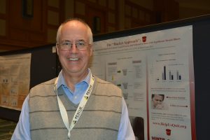Dr. Bruce Christiansen presents a poster.