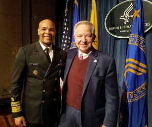 US Surgeon General Dr. Jerome Adams and Dr. Michael Fiore