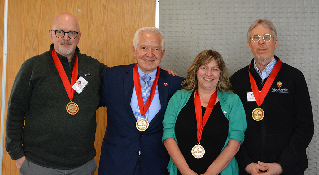 UW-CTRI colleagues from left: Thirty-year longevity medal awardees Dr. Doug Jorenby, Dr. Michael Fiore, Lisa Rogers and Dr. Stevens Smith celebrated. Not pictured but not forgotten: Dr. Tim Baker.