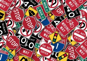 Stop signs and wrong way signs