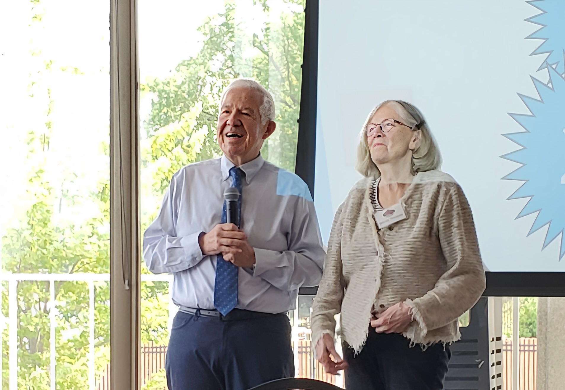 Dr. Michael Fiore honors Dr. Wendy Theobald for her contributions to help people quit smoking at UW-CTRI. 
